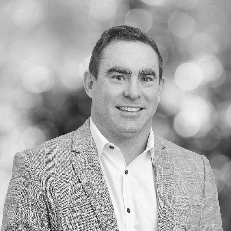 Headshot of Adam West